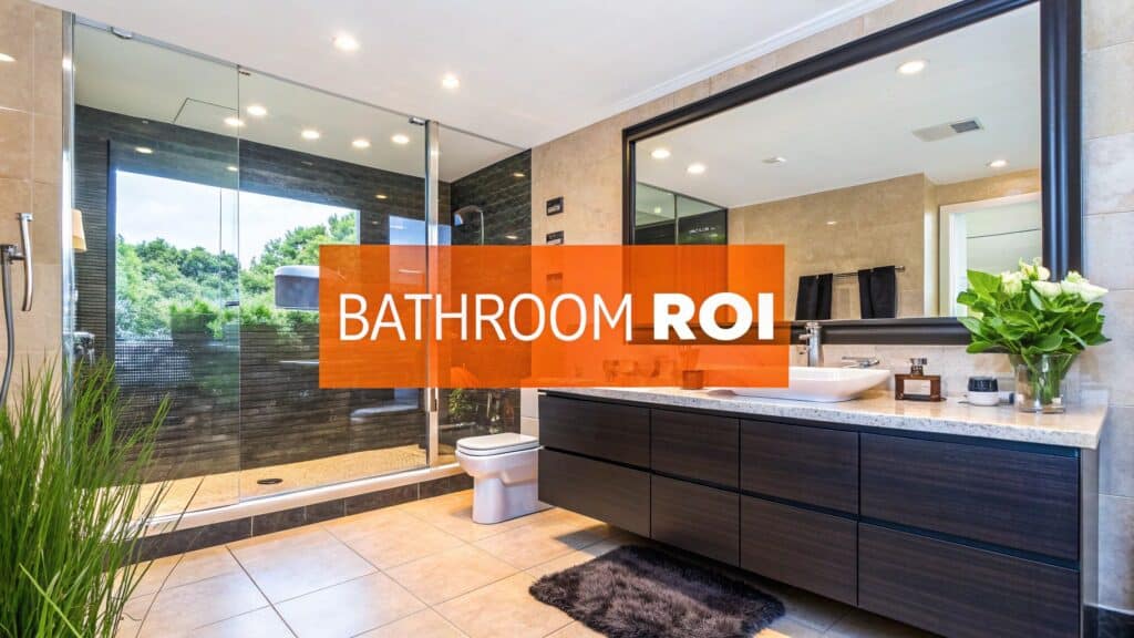 Modern bathroom interior showcasing a sleek design with a glass shower, dark cabinetry, and decorative plants, overlaid with the text "BATHROOM ROI," emphasizing the investment value of bathroom remodels in Orange County.