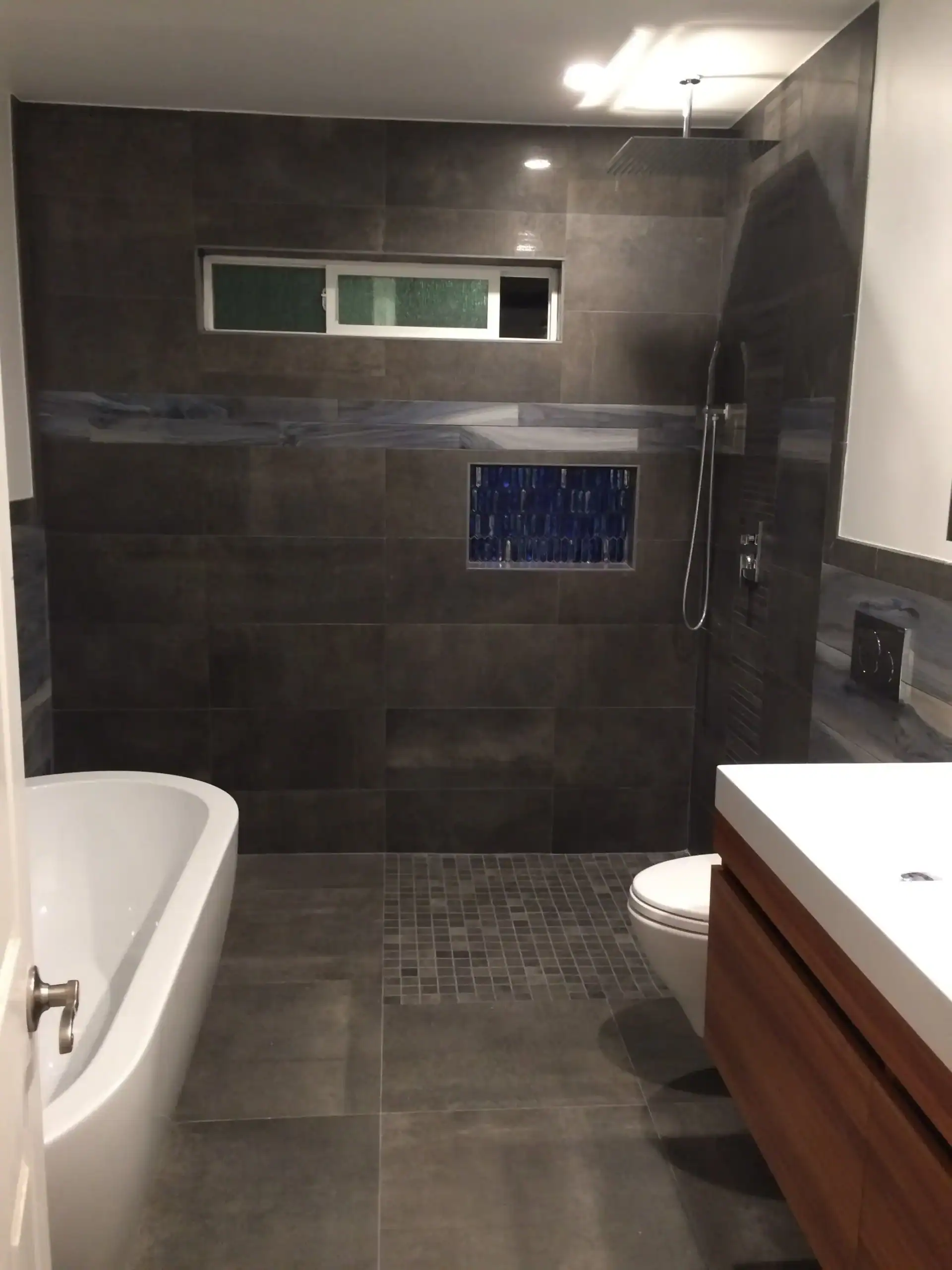 Contractor consulting with homeowner on bathroom remodel plans